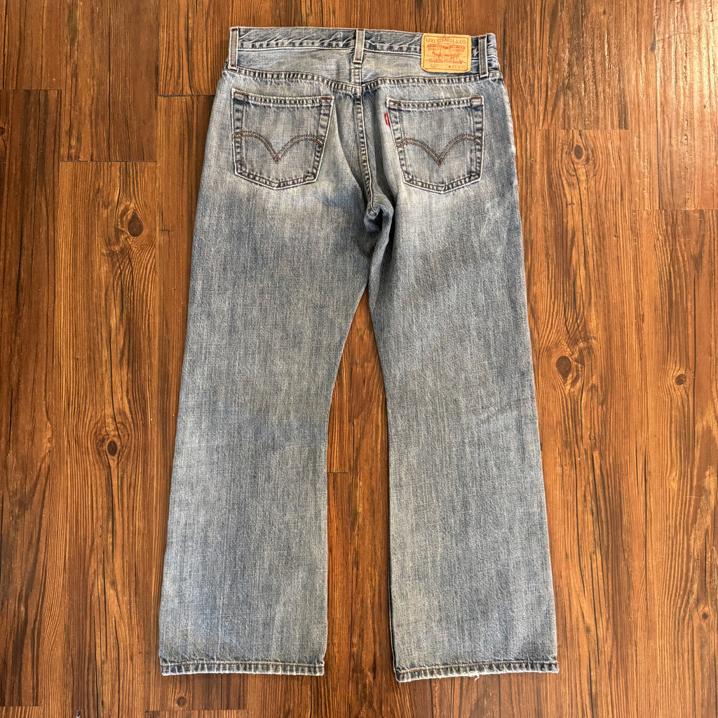 Vintage Levi's Yellow Star Knee Jeans