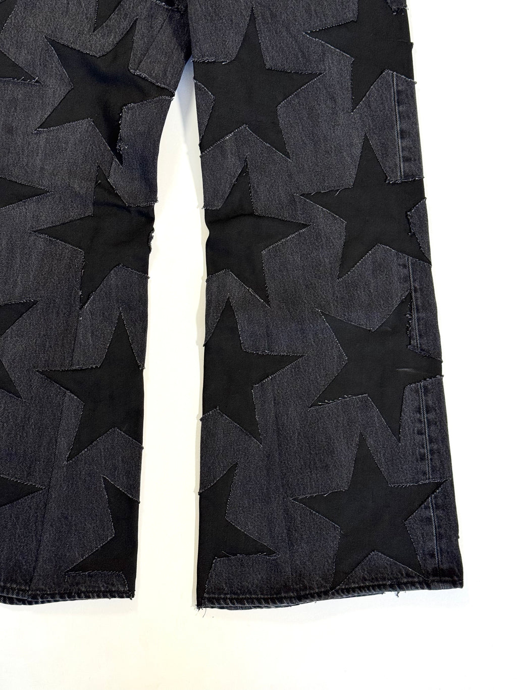 Black on Black All Over Star Jeans (Size 34)