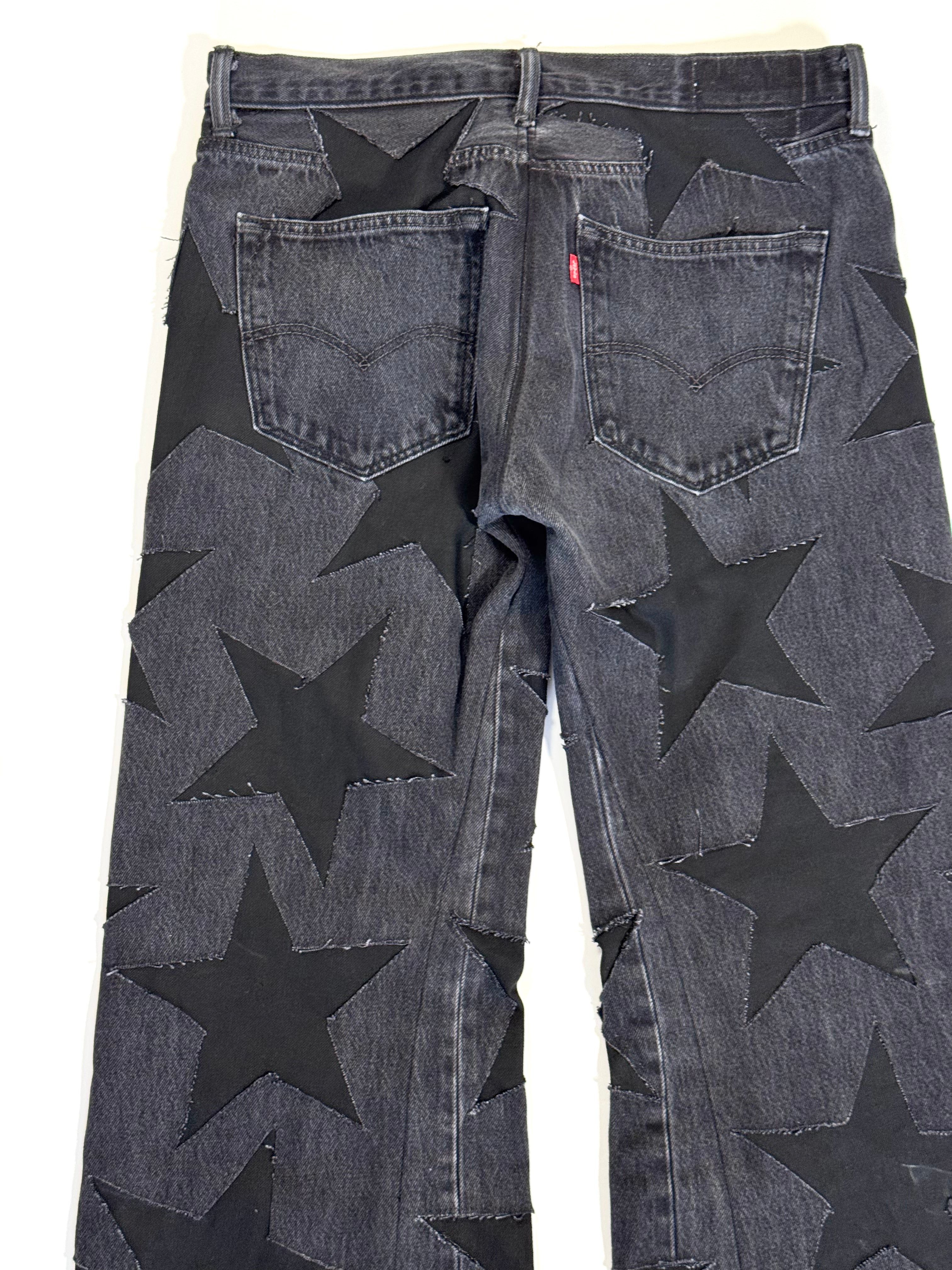 Black on Black All Over Star Jeans (Size 34)