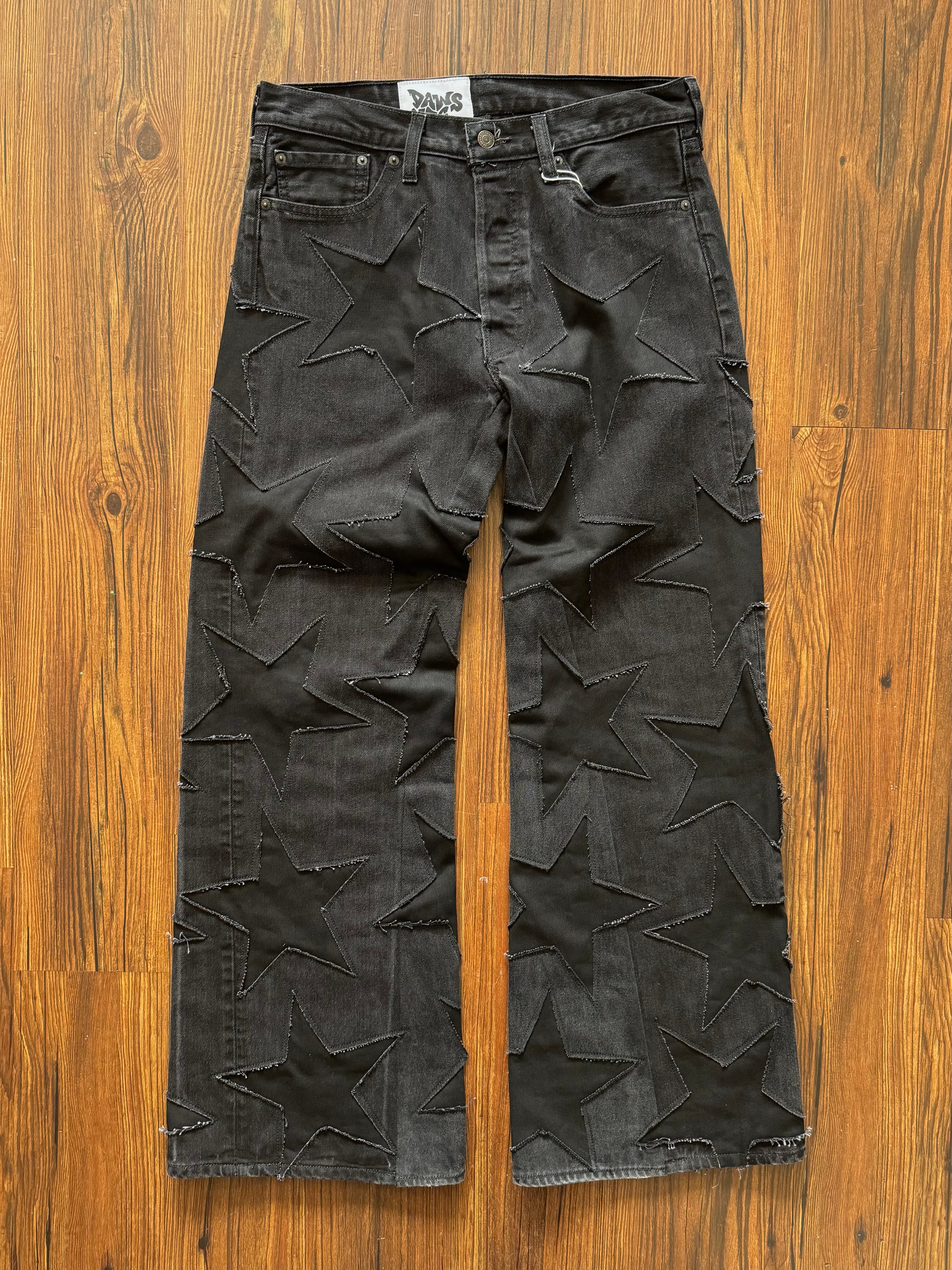 Black on Black All Over Star Jeans (Size 32)