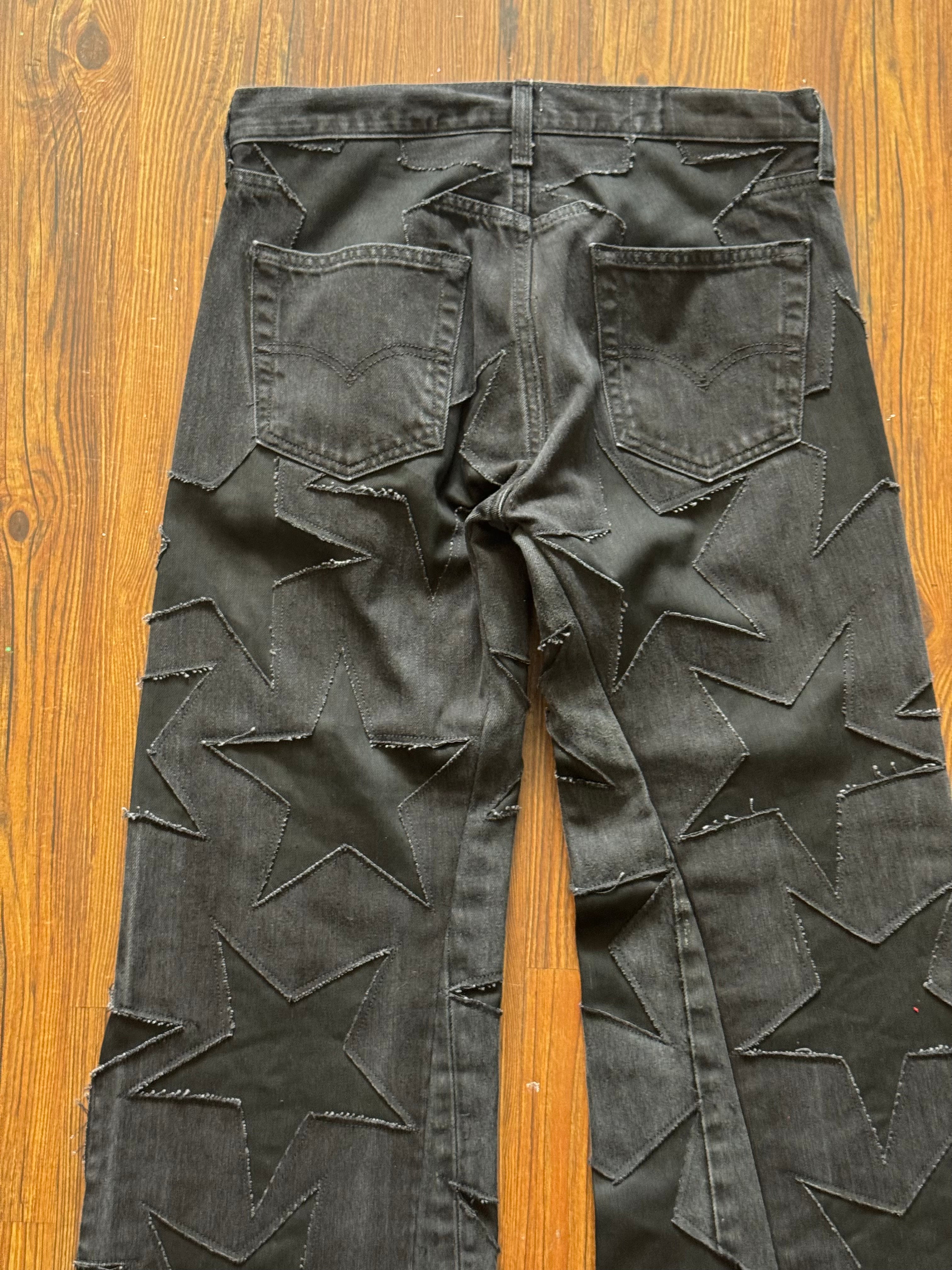 Black on Black All Over Star Jeans (Size 32)