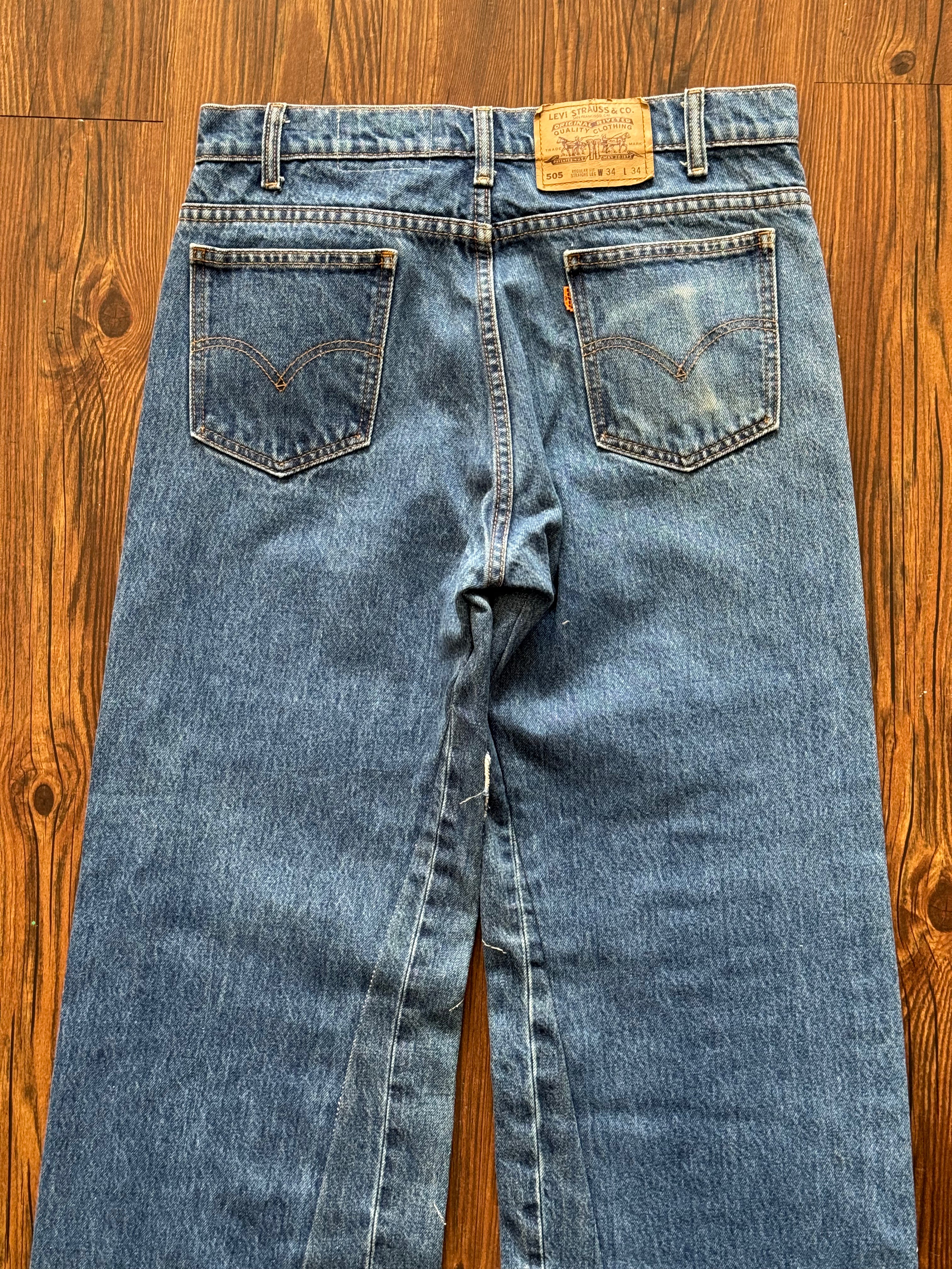 Dark Washed Patchwork Jeans (Size 34)