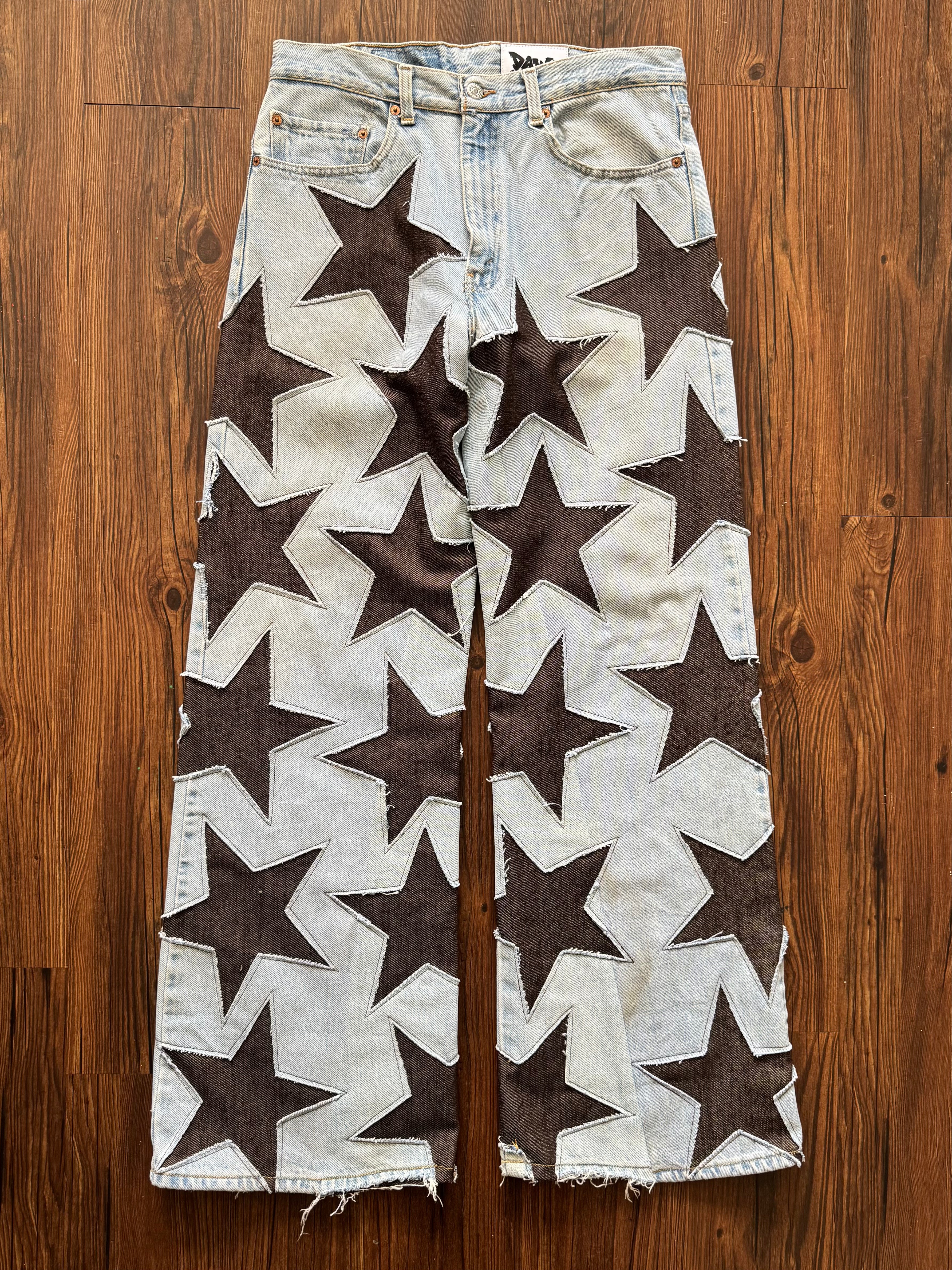 Light Wash Brown All Over Star Jeans (Size 32)