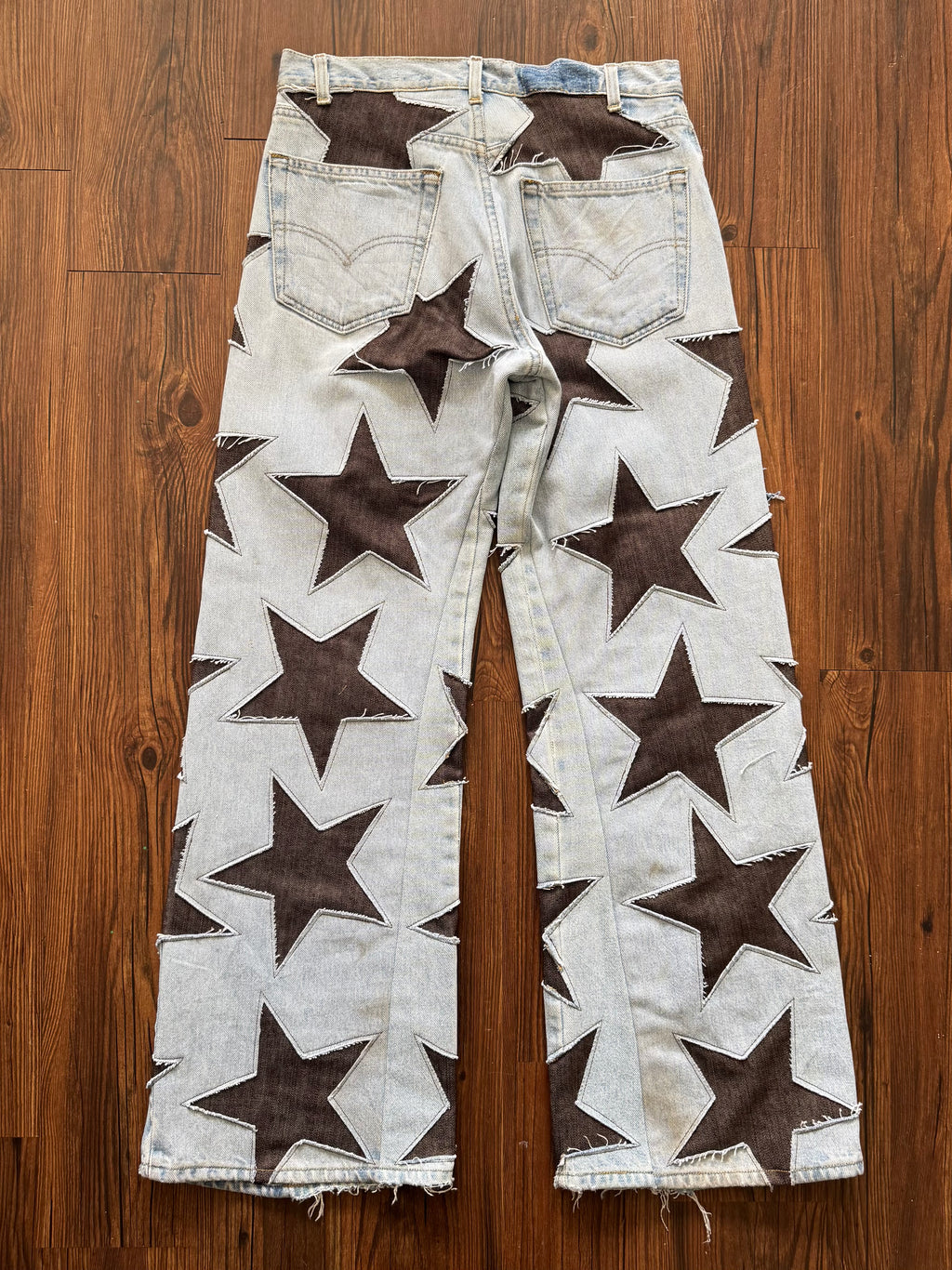 Light Wash Brown All Over Star Jeans (Size 32)