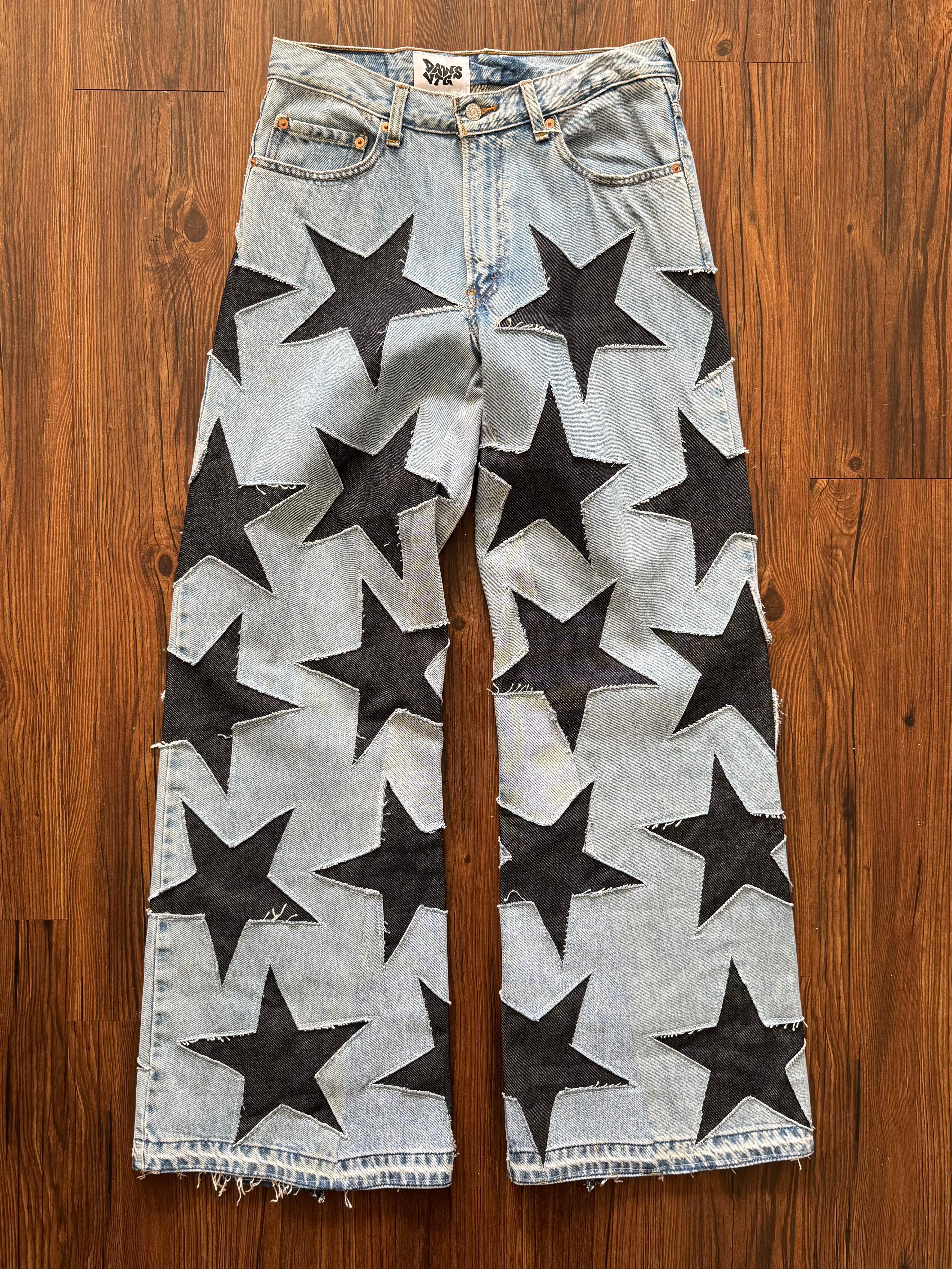 Light Washed All Over Star Jeans (Size 32)