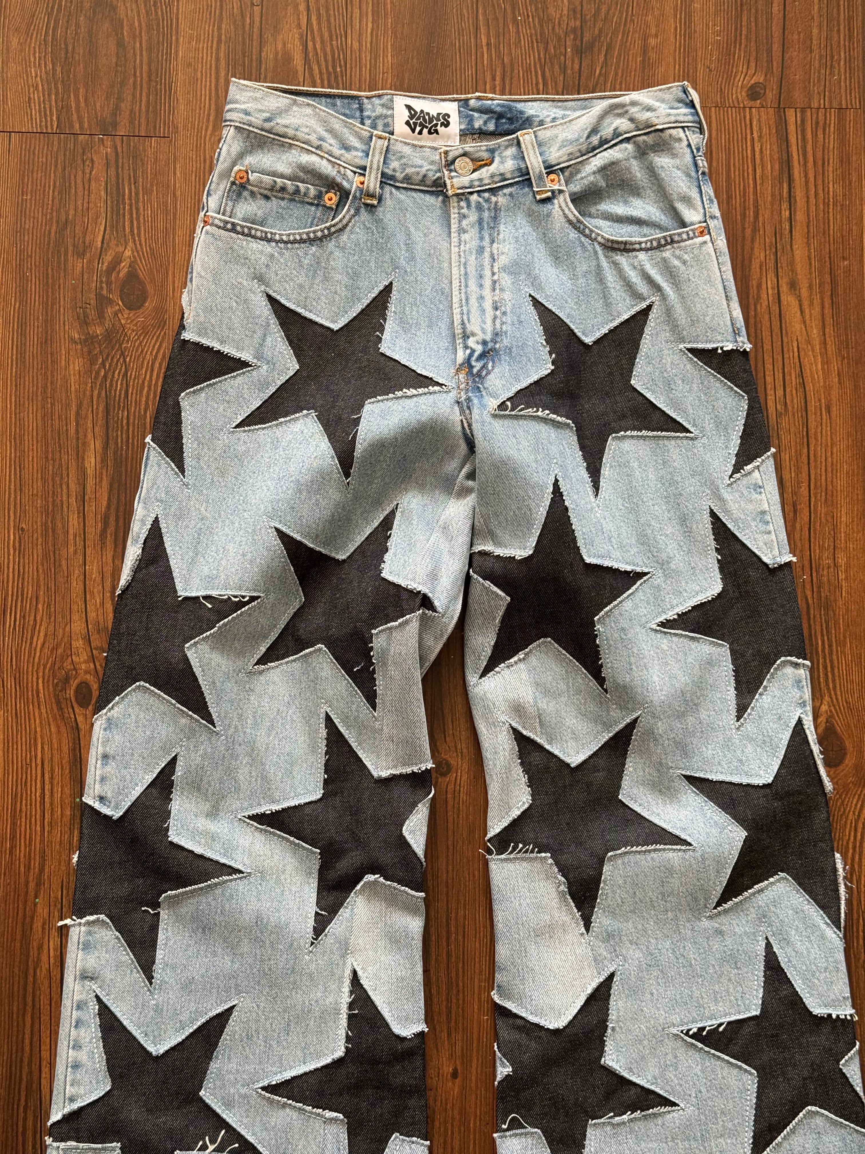 Light Washed All Over Star Jeans (Size 32)